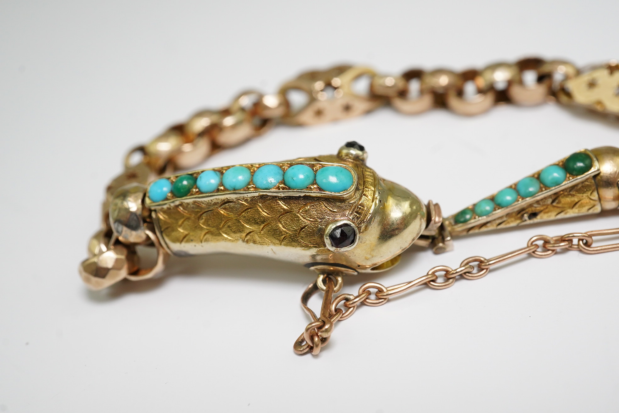 A Victorian gold and turquoise cluster set serpent bracelet